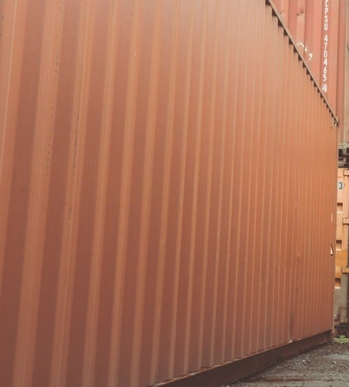 Standard Size Dry Shipping Containers Safely Stacked Up at the Port